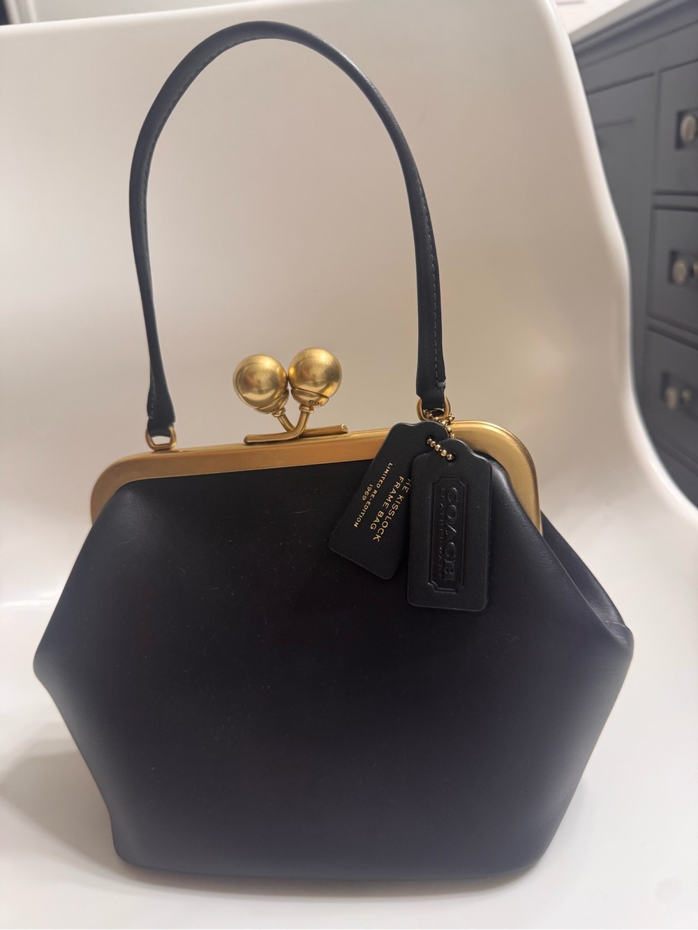Coach Black Leather Top-Handle Kiss Lock Bag 16 with Gold Frame
